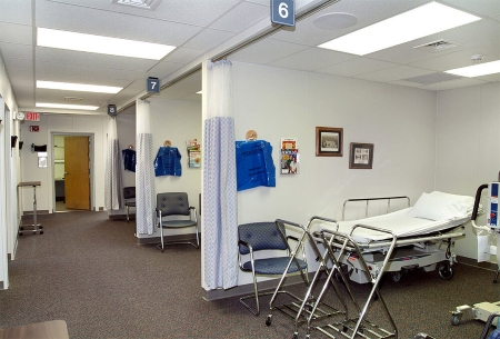 Organized modular healthcare room with patient stations and privacy dividers in Pedricktown, NJ