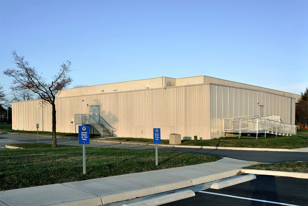 Large beige modular Healthcare space with parking spaces and a ramp in Pedricktown, NJ