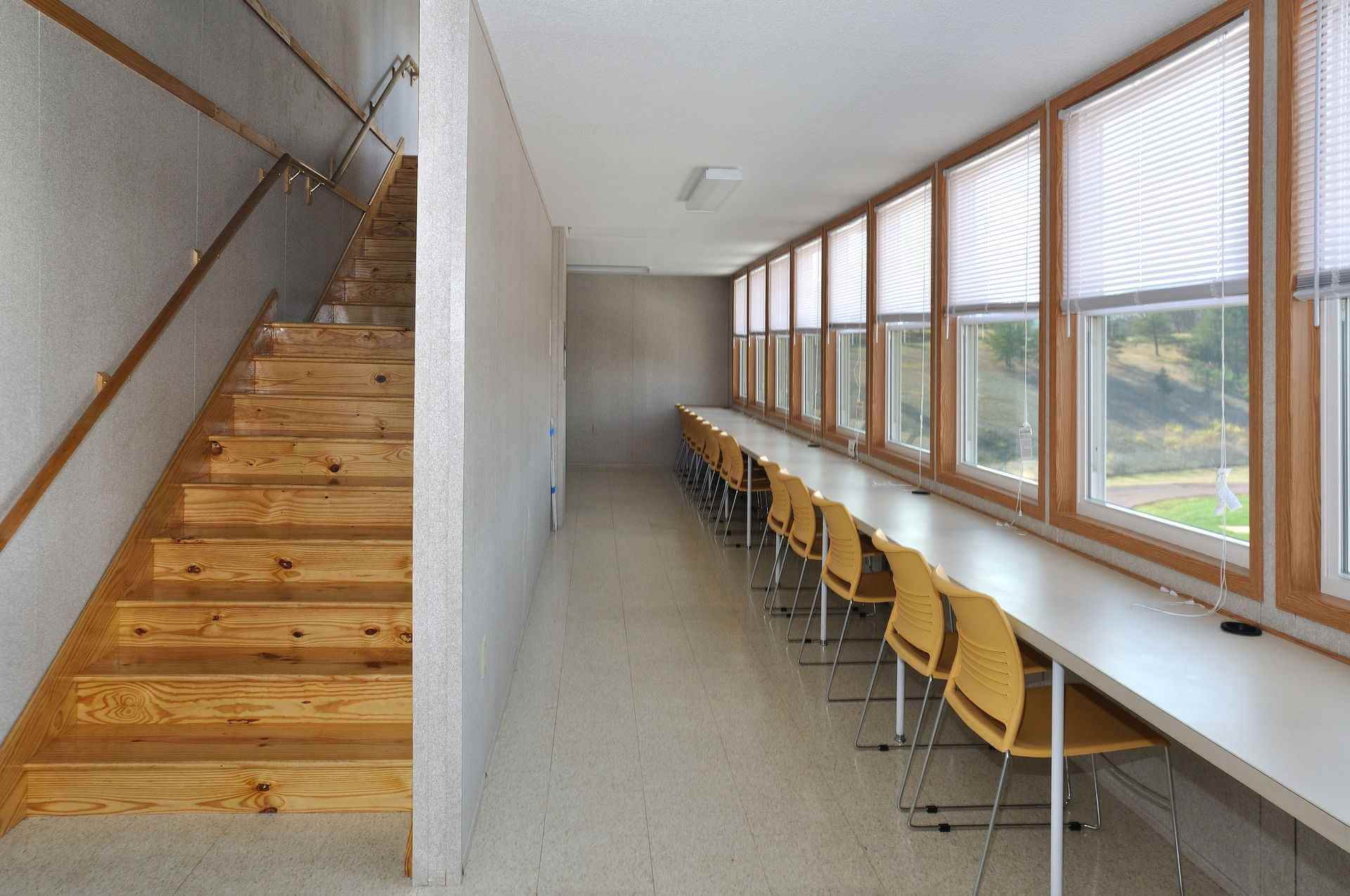 Modular commercial office by Mobilease Modular Space with desks, chairs, stairs & ideal workspace